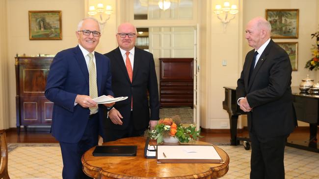 The Governor-General, Sir Peter Cosgrove receiving Malcolm Turnbull and George Brandis for the assent of the Marriage Amendment Bill. Picture: Kym Smith.