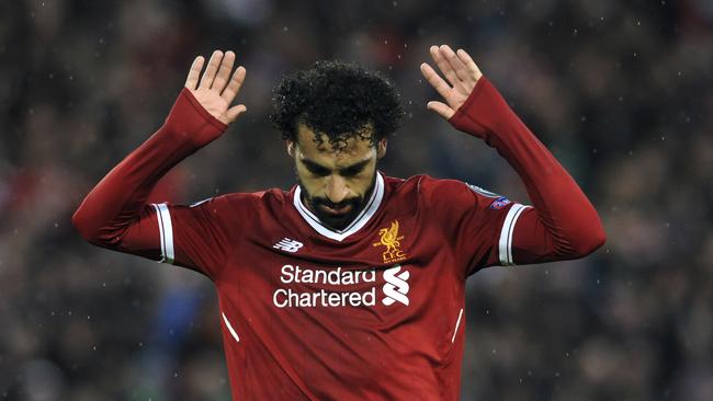 Liverpool's Mohamed Salah celebrates after scoring his side's second goal