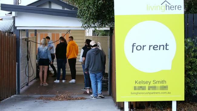 People line up to inspect a rental property. Picture: Steve Pohlner