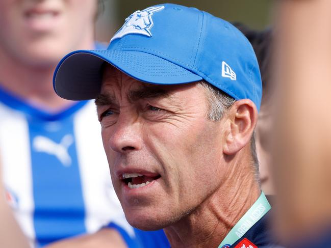 MELBOURNE, AUSTRALIA - MARCH 03: Alastair Clarkson, Senior Coach of the Kangaroos addresses his players during the 2024 AFL AAMI Community Series match between the St Kilda Saints and North Melbourne Kangaroos at RSEA Park on March 03, 2024 in Melbourne, Australia. (Photo by Dylan Burns/AFL Photos via Getty Images)