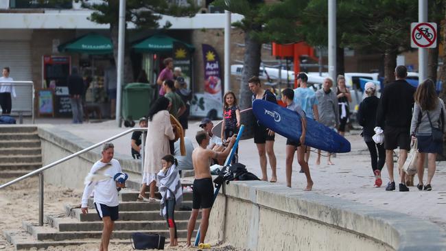 At times there was a lack of social distancing in parts of Manly on the beach front and a cafe last weekend on the South Steyne. Picture John Grainger