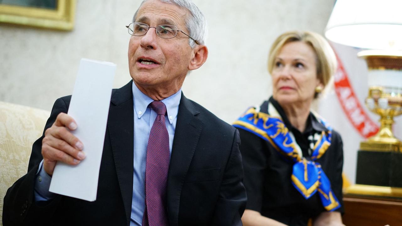 Dr Fauci and Dr Birx in the Oval Office last year. Picture: Mandel Ngan/AFP