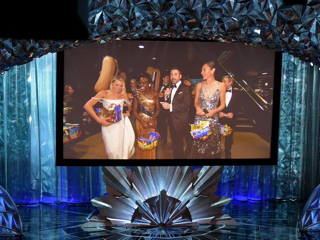 Via video feed, Margot Robbie, Lupita Nyong'o, Jimmy Kimmel, and Gal Gadot left the Dolby Theatre to surprise cinemagoers nearby. Picture: Getty Images
