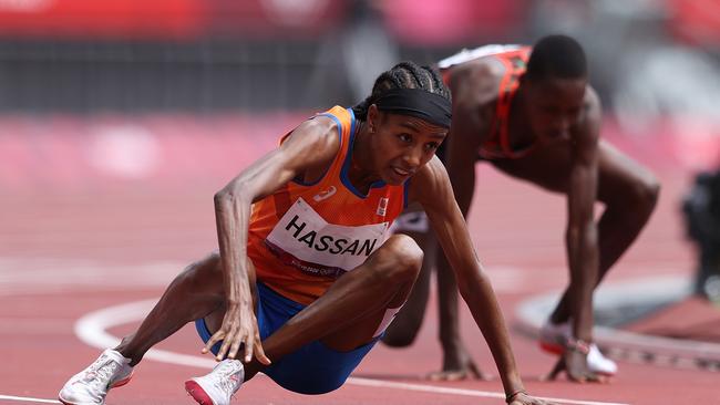 Sifan Hassan of Team Netherlands gets back up after falling over. Picture: Michael Steele/Getty Images)