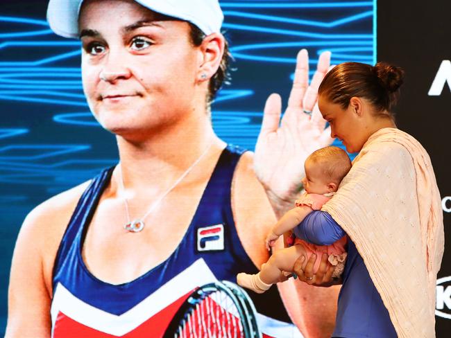 MELBOURNE, AUSTRALIA - JANUARY 30: Ashleigh Barty of Australia holds her niece Olivia during a press conference after defeat in her Women's Singles Semifinals match against Sofia Kenin of the United States on day eleven of the 2020 Australian Open at Melbourne Park on January 30, 2020 in Melbourne, Australia. (Photo by Mike Owen/Getty Images)