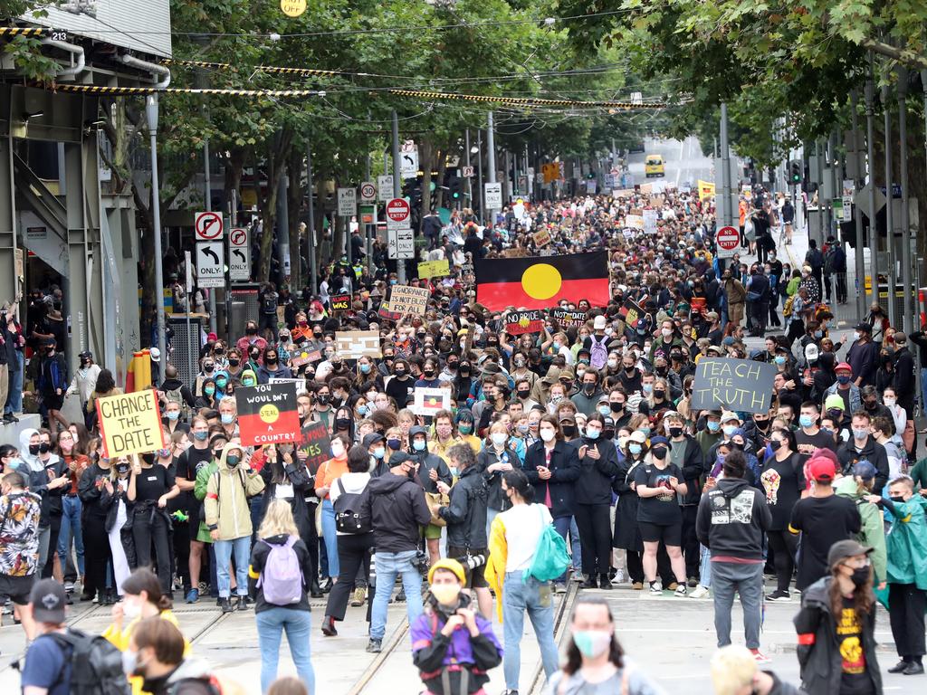 Crowds marching at a rally in Melbourne to change the date of Australia Day celebrations. Picture: Alex Coppel.