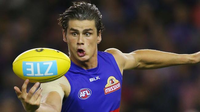 MELBOURNE, AUSTRALIA - APRIL 16: Tom Boyd of the Bulldogs eyes the ball during AFL Round 4 match between the Carlton Blues and the Western Bulldogs at Etihad Stadium on April 16, 2016 in Melbourne, Australia. (Photo by Michael Dodge/Getty Images)