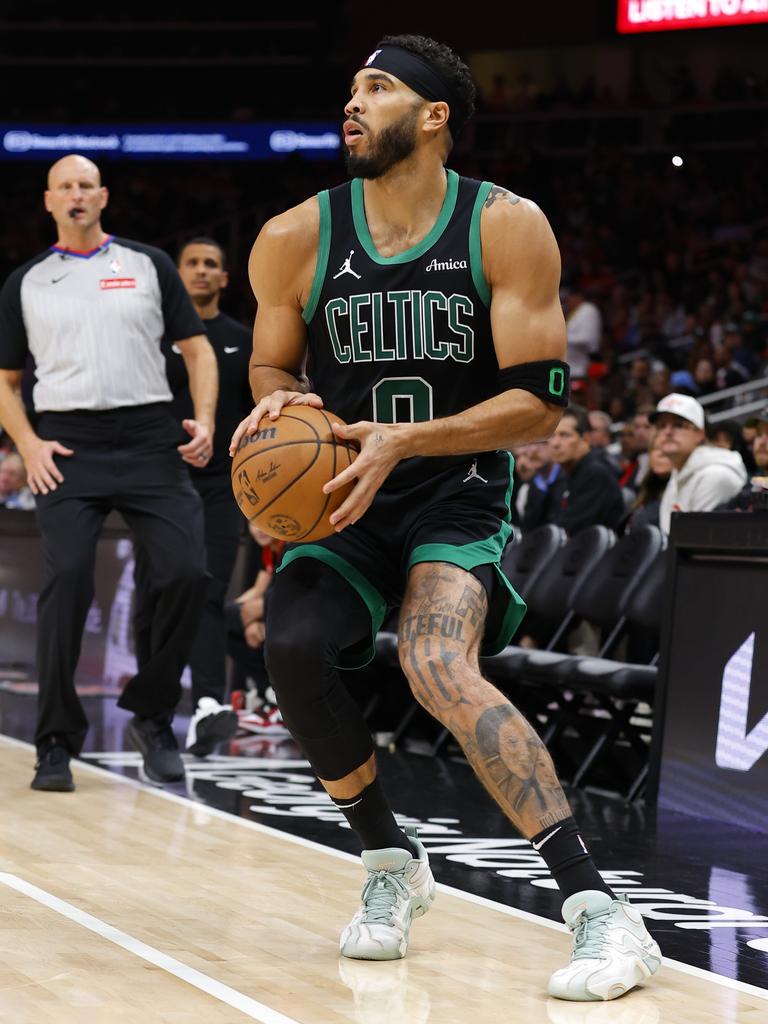 Celtics star Jayson Tatum shoots a corner three. (Photo by Todd Kirkland/Getty Images)