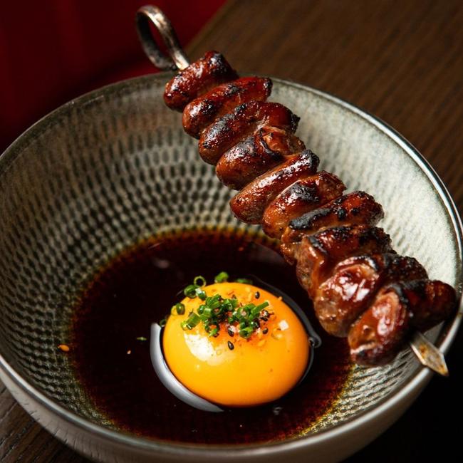 The Boom Boom Room's chicken hearts yakitori, with egg yolk, soy, shichimi and chives. Picture: The Boom Boom Room