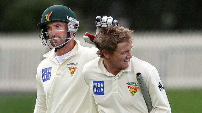 Young George Bailey (R) is congratulated by veteran Michael DiVenuto. Picture: News Corp