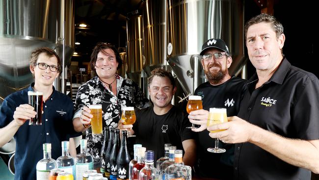 Cairns Craft Beer Festival on May 8 at Hemingway's Brewery in Cairns. Cairns and district local brewers and distillers Nico Leffler from Hemingway's, Mark Watkins from Mt Uncle, Sam Kennis from Wolf Lane, Rob Callin from Macalister and Pete Muskins from Sauce looking forward to showing off their wares. Picture: Stewart McLean