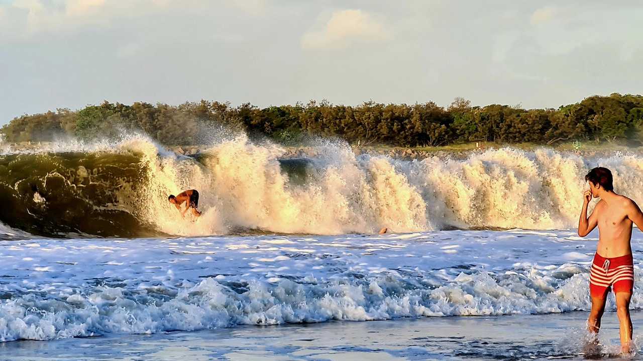 Bodysurfers make the most of the swell off Mooloolaba generated by Cyclone Gretel. Picture: Mark Furler