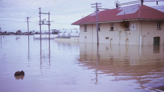 Gasworks during flood, Bundaberg, 1971. A shocking image of buildings resilience among floodwaters. Source: QLD Places