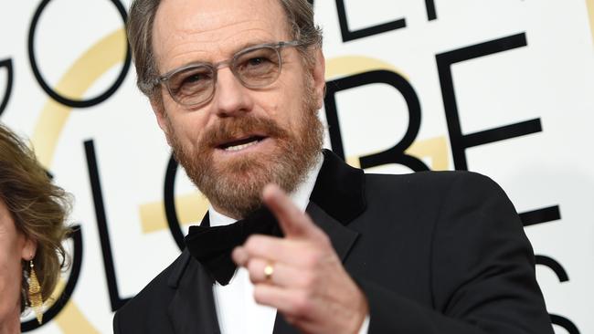 Bryan Cranston arrive at the 74th annual Golden Globe Awards at the Beverly Hilton Hotel.