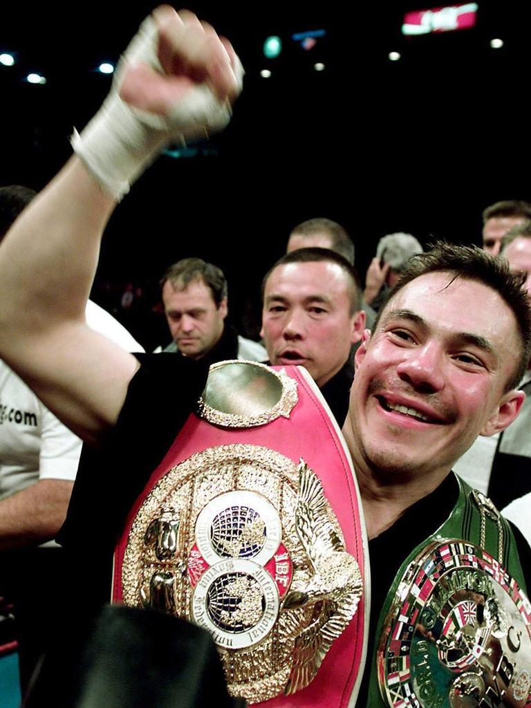 Kostya Tszyu celebrates after defeating Zab Judah. Picture; AFP PHOTO John Gurzinski