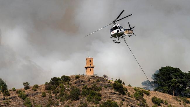 Centenary Tower surrounded by smoke. Picture: Tim Rosenthal