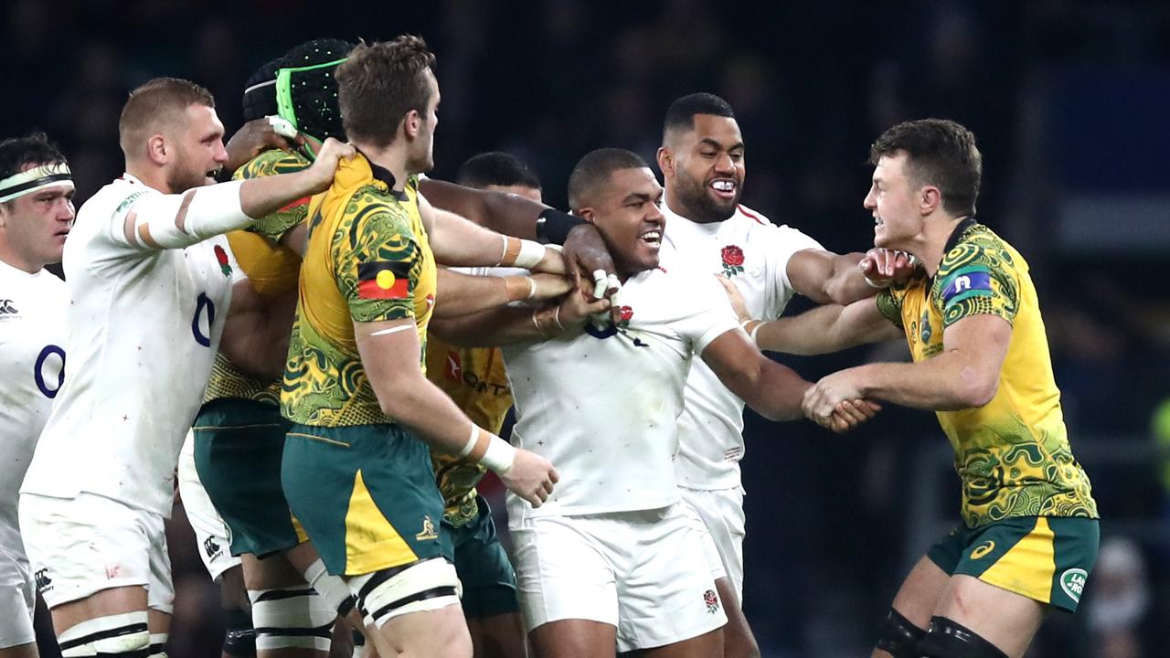 Kyle Sinckler of England clashes with Jack Dempsey of Australia at Twickenham.