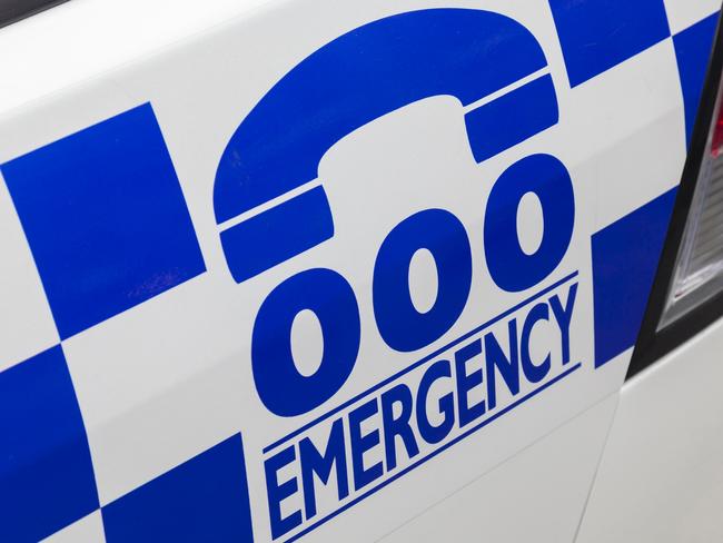 Emergency number 000 in Australia on a police car . Picture: iStock