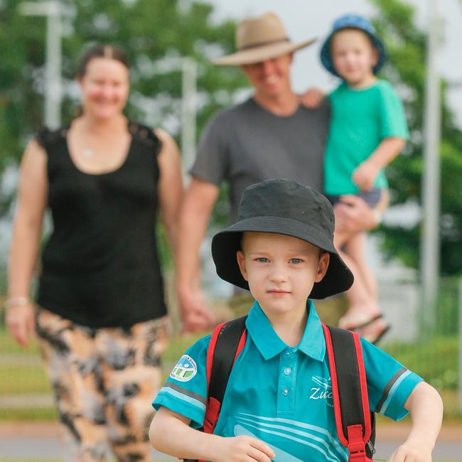 Tash and Brad Ford with their kids Huxlee 4 and Oscar 5 on Oscar’s first day of school at Zuccoli Primary. Picture: GLENN CAMPBELL