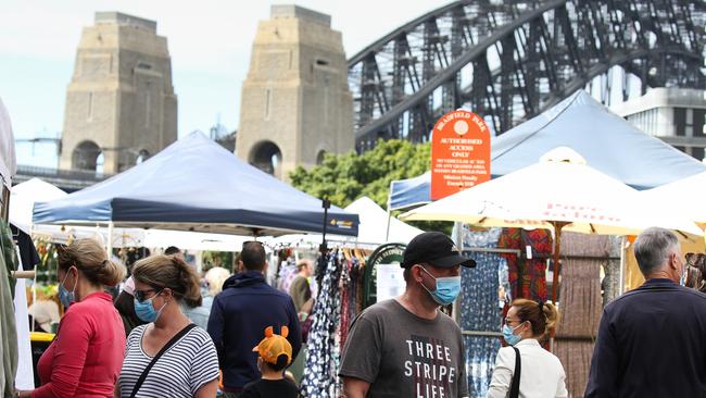 Sydneysiders visit the markets while exercising the choice to wear masks. Picture: NCA Newswire / Gaye Gerard