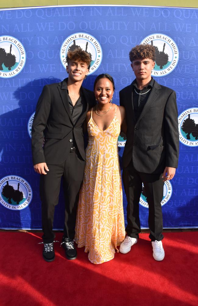 Leon, Rafael and a teacher at the Sunshine Beach State High School formal 2024.