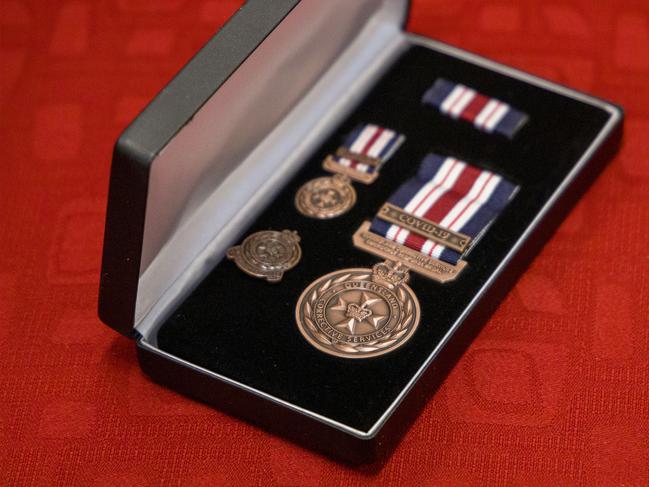 Thirteen Mackay-based Community Corrections Officers were this week awarded the Emergency Response Medal with Covid-19 clasp as a thanks for their commitment to keeping Queenslanders safe when the pandemic shut state and international borders.Â Picture: Contributed