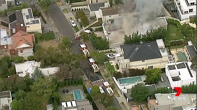 Firefighters are battling a blaze at a Bluff St, Hawthorn East home.