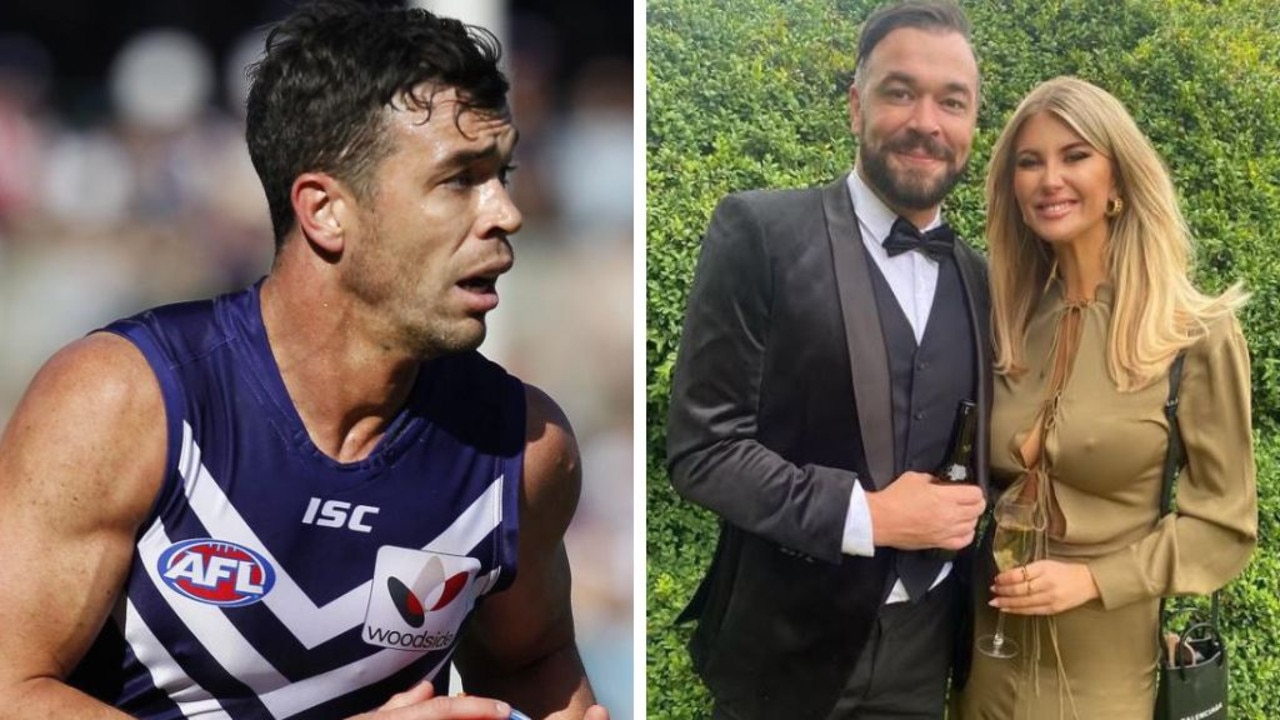 Ex-AFL star charged with domestic violence