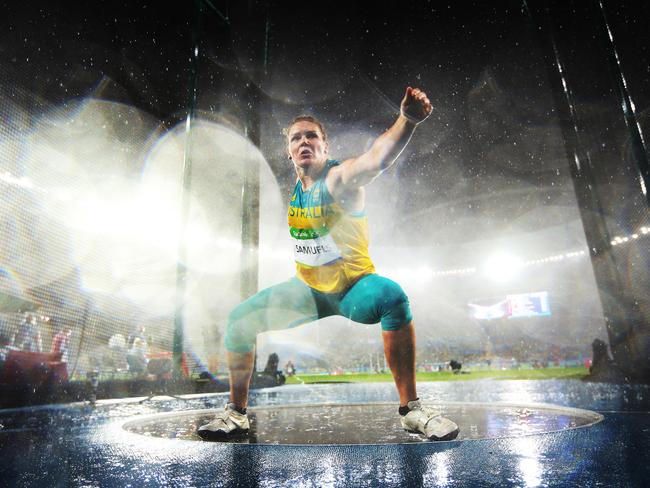 Australia's Dani Samuels in pooring rain in the Women's Discus Qualifying during the Athletics at the Olympic Stadium on Day 10 of the Rio 2016 Olympic Games. Picture. Phil Hillyard