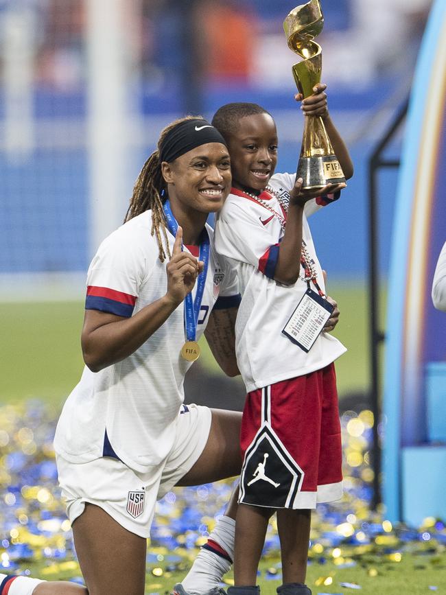 McDonald and her son after winning the 2019 World Cup. Photo by Maja Hitij/Getty Images