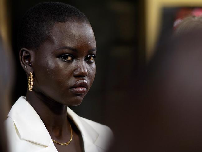 Model Adut Akech speaks to the media during a Melbourne Fashion Week press conference in Melbourne, Wednesday, August 28, 2019. Model Adut Akech says she will continue to speak out about racism after a magazine published an interview with her but used a photo of another African-Australian model. (AAP Image/Alex Murray) NO ARCHIVING