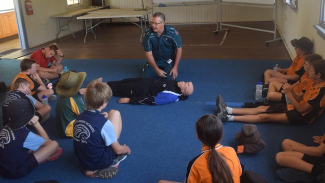 EMERGENCY INSTRUCTION: Biloela Ambulance Service officer-in-charge Terry Zillman teaches students vital CPR knowledge at the Biloela PCYC.