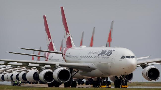 01/04/2020: Two Qantas A330's sit parked in front of nine Jetstar 787's at Avalon. QANTAS, Jetstar & Virgin airlines are storing a large number of their aircraft at Avalon Airport, near Geelong, as the Coronavirus brings air travel to a near halt. Stuart McEvoy/The Australian.
