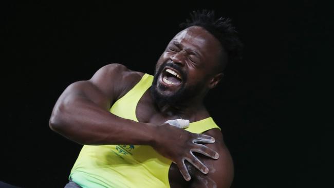 Australia's Francois Etoundi tore his bicep on his way to winning a bronze medal.