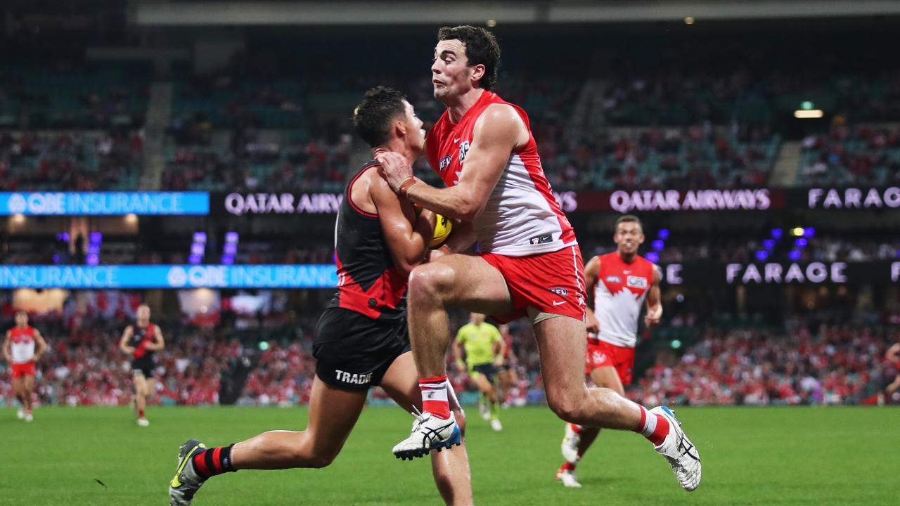 Jye Caldwell hurt his shoulder in this clash against Tom McCartin against Sydney in round 9 (Photo by Matt King/AFL Photos/via Getty Images)