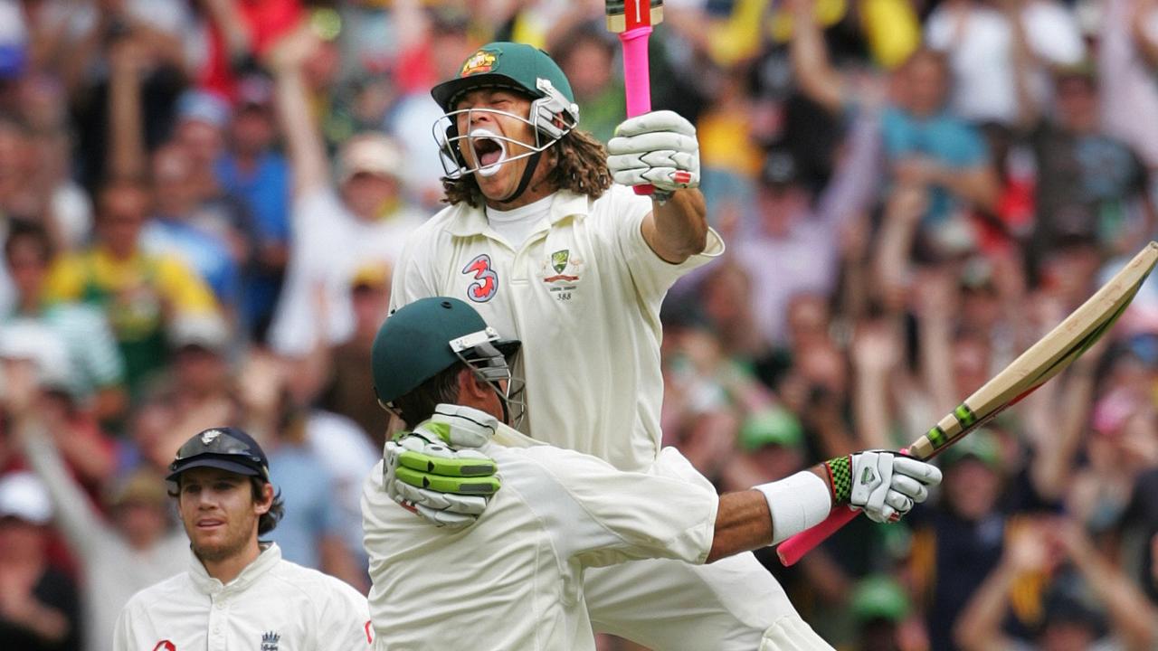 27 Dec 2006 - 4th Ashes Test - Aust vs England at the MCG - Andrew Symonds celebrates his first Test century by leaping into the arms of teammate Mastthew (Matt) Hayden after scoring his maiden test century.. picPhil/Hillyard sport cricket action yelling