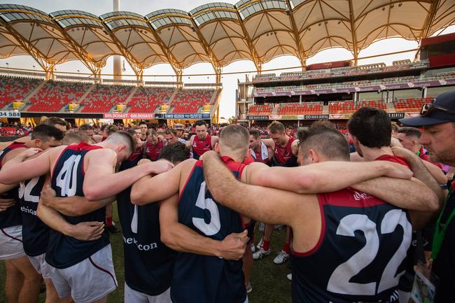 Surfers Paradise in huddle during 2019 QAFL grand final at Metricon Stadium. Photo: SURFERS PARADISE DEMONS/FACEBOOK