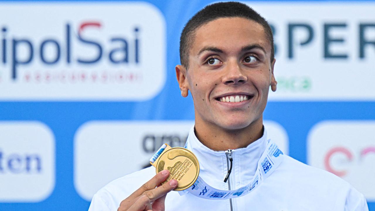 It’s quite the show and tell for the kid. Photo by Alberto PIZZOLI / AFP