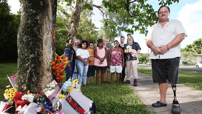 Spokesperson for the Crime &amp; Justice Action Group Aaron McLeod is organising a rally at Member for Cairns Michael Healy's office on Spence Street this Friday. Aaron McLeod with Patricia Ansey-Passi, Jodie McLeod, Lona Pulti, Barbara Nona, Sonya Panuel, Paul Brady, Helen Ghee, David Grey and Mick Toal with Bourke at the site of a fatal crash at Manoora, where a 14-year-old boy died on Monday morning. Picture: Brendan Radke