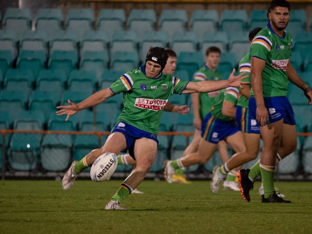 Owen Pattie kicks for the Raiders. Picture: Thomas Lisson.