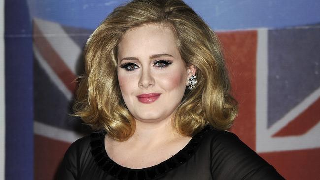 Pop pals: Adele and Robbie Williams bonded over their babies while living in LA.