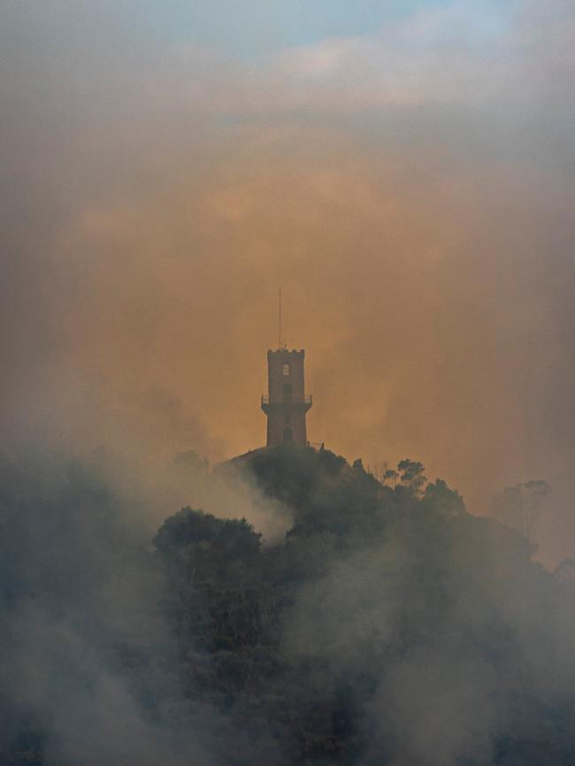 The scrub fire which ignited early on Tuesday morning blanketed Mount Gambier’s Centenary Tower in smoke. Picture: Tim Rosenthal