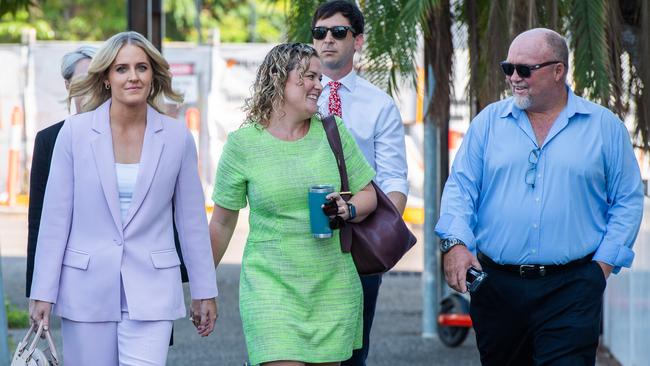 Channel 9 Darwin journalist Georgina Sarah Dickerson, left, arrived at Darwin Local Court on Wednesday backed by her chief of staff Kathleen Gazzola and General Manager Steve Shervill. The 26-year-old was charged with impersonating a police officer. Picture: Pema Tamang Pakhrin