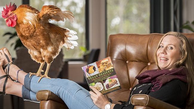 Girl with pet chickens