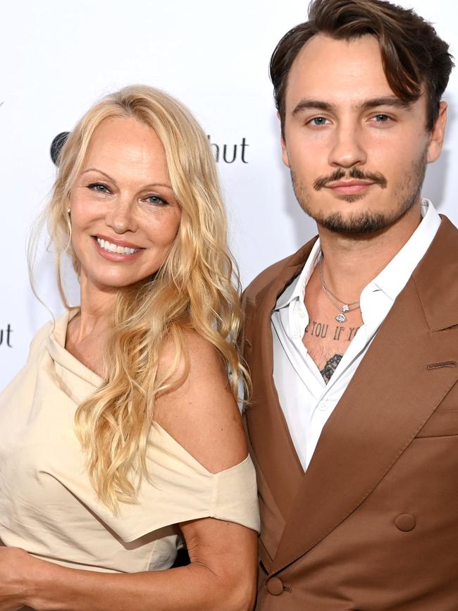 Pamela Anderson wears minimal makeup on red carpets (pictured with her son, Brandon Thomas Lee, earlier this year). Picture: Getty Images