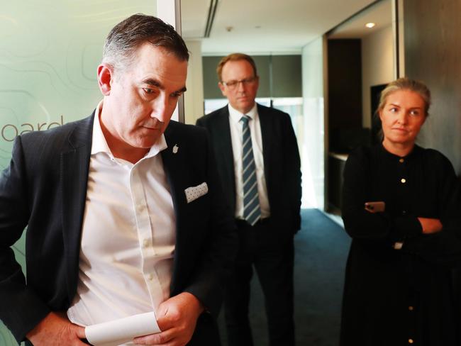 21/4/20: Virgin Australia CEO Paul Scurrah (left) and administrator Vaughan Strawbridge of Deloitte(right rear) and a media advisor(female right). They will try to restructure the airline's $5bn debt and bring it back to life. John Feder/The Australian.