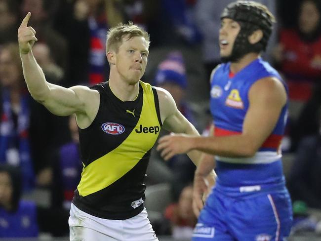 Jack Riewoldt of the Tigers celebrates after kicking his 500th goal