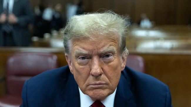 Former president Donald Trump appears ahead of the start of jury selection at Manhattan Criminal Court.