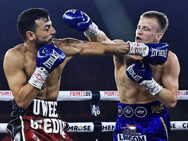 Liam Wilson (R) put in a solid performance in his lightweight debut. Picture: No Limit Boxing