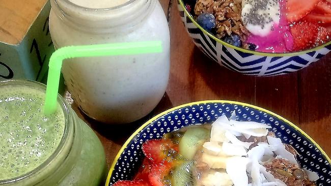 Bare Naked Bowls green hemp smoothie, pear and almond smoothie, the Manly acai bowl (front) and pitaya bowl.